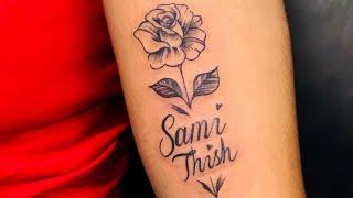 A tattoo Rose Flower with Husband and son’ short name. #tattoo #viral #freehandtattoo #tattooassist