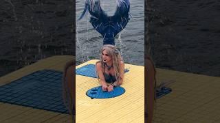 Mermaid climbs onto a raft and splashes around (East Jordan, MI)