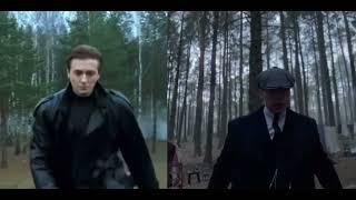 Sasha Belov and Thomas Shelby walk through the forest