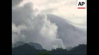 Mount Kelud volcano spitting out fresh clouds of smoke