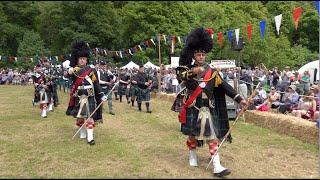 Scotland the Brave as the combined Pipe Bands march in for opening of the 2024 Drumtochty Games