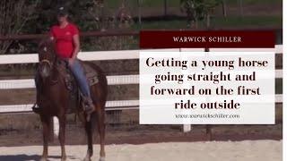 The key to getting a young horse going straight and forward on the first ride outside