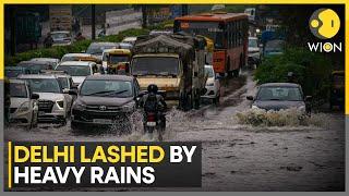 Heavy rain lashes Delhi: India's capital lashed by heavy rains | Rains to bring respite from heat