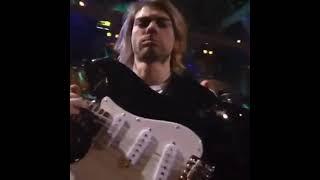 Kurt Cobain spitting on a camera at Live And Loud