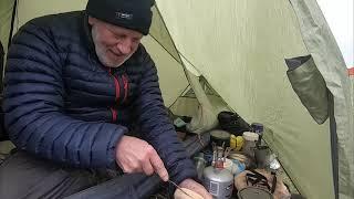 cooking, while wild camping in my tent