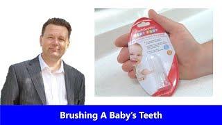 Brushing Baby's Teeth - How to use baby's first toothbrush