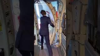 Flight Attendant | Stewardess closing Airplane Door 