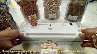 Vacuum packing dry fruits to keep them fresh for longer time with vacuum sealer machine