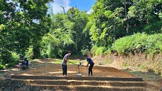 Resettlement project progress update: Filling land, compacting the foundation. Taking care of pets