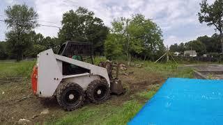 brush clean up in Powder Springs, GA. Bobcat skid steer service.