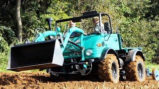 UNIMOG TRACTORS WORKING IN THE FIELD