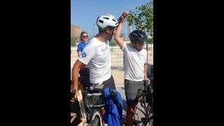 After a three-month bicycle journey, two French football fans arrive in Doha from Paris