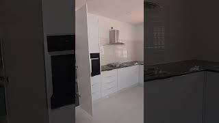 L-SHAPE KITCHEN. Iceberg Gloss finish.silver black galaxy worktop.Newmatic appliances