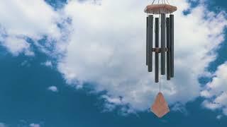 ENJOY THE WINDCHIMES WITH BLUE SKY AND WHITE CLOUDS