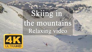 4K Skiing in the mountains during a perfect sunny day. Hiking Travel UHD