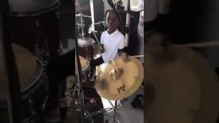 8 yrs old kid haitian  drummer