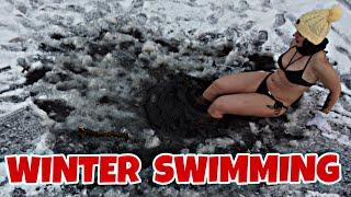 WINTER SWIMMING IN ICE HOLE