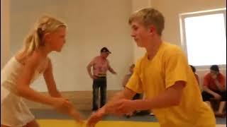 Mixed wrestling - girl wrestles older boy