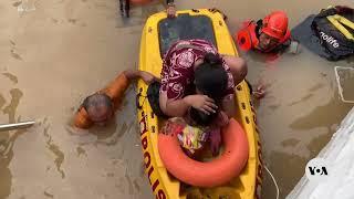 Indonesia: Rescuers evacuate residents from flooded neighborhood in Jakarta | VOA News