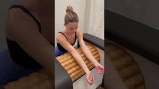 CYL Infrared Studio   Forearm Massage on Lymphatic Massage Roller