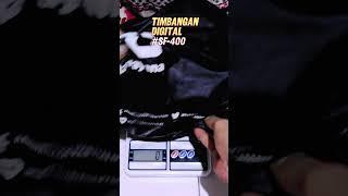 kirim paket buket bunga pake timbangan digital