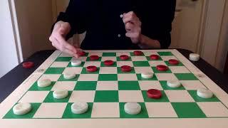 Checkers traps aplenty in the Cross opening (9-14 exchange variation)