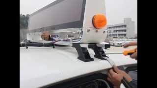 LED taxi roof top sign installation