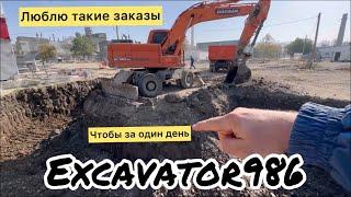 Котлован за городом, выезд на колёсном экскаваторе,excavator,Doosan190￼ ￼￼ ￼￼￼