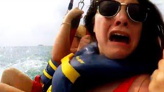 Vacationers Spot Sharks in Water While Parasailing