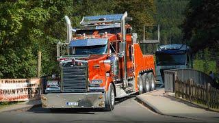 American custom semi Trucks on smal roads in Europe with open pipes sound