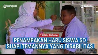 Penampakan Haru , Anak SD Tak Malu Suapi Temannya yang Disabilitas