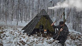 Solo Hot Tent Winter Camping in Snow Storm ~ Wood Stove ️ [ Catch and Cook, Primitive Fishing ]