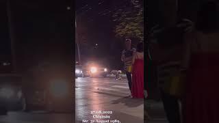 woman pissing on the road infront of police in moldova