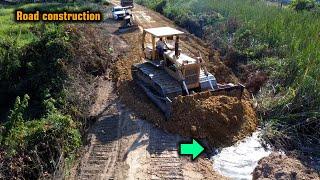 Still strong Dozer Kumatsu D60 & Truck 5T Pushing soil and Clear Tree to crate road size 400m