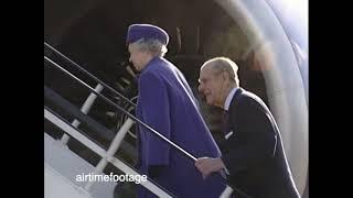 Late Queen and Duke in front of aircraft engine