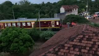 [4K60]Murikandi-Kankesanthurai Yal Rani regional train passes Kacheri, Jaffna