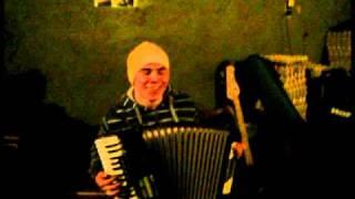 Rupor plays the accordion.mpg