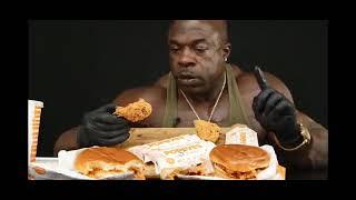 Black man farts while eating chicken