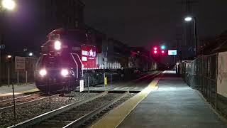 Freshly repainted WAMX 6026 leads WSOR T001 at Morton Grove, twice, once in the snow!