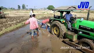 tractors stuck in mud  Jagan Village Drive