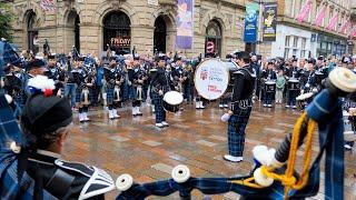 The Royal Edinburgh Military Tattoo Pipes & Drums Outside TGI Fidays for Piping Live! 2024 | Glasgow