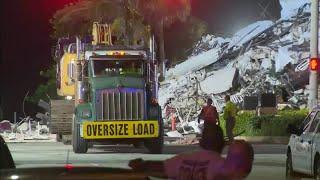 Rescue crews continue their search a day after Surfside building collapse