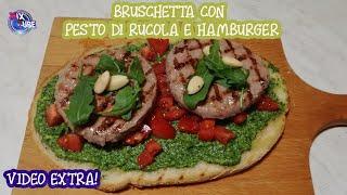 Bruschetta con pesto di rucola e Hamburger