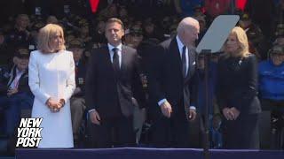 Awkward moment Jill Biden appears to tell Joe not to sit at D-Day ceremony, but he does anyway
