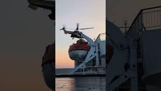 Footage of SAR helicopter on mission to passenger ship in the baltic sea