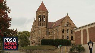 Students protest West Virginia Univ. budget cuts targeting academic programs and jobs