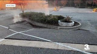 A fire that sparked in a underground storm water system caused parking lot to collapse