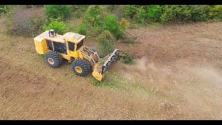 One of the LARGEST Forestry Mulchers made!!  Tigercat 726 Mulcher in action