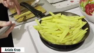 Aniela quickly fries potatoes