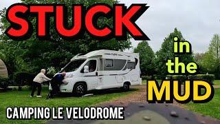 They are STUCK!! STUCK in MUD at Camping Le Velodrome. MOTORBIKE TRAVEL in FRANCE. PILOTE MOTORHOME.